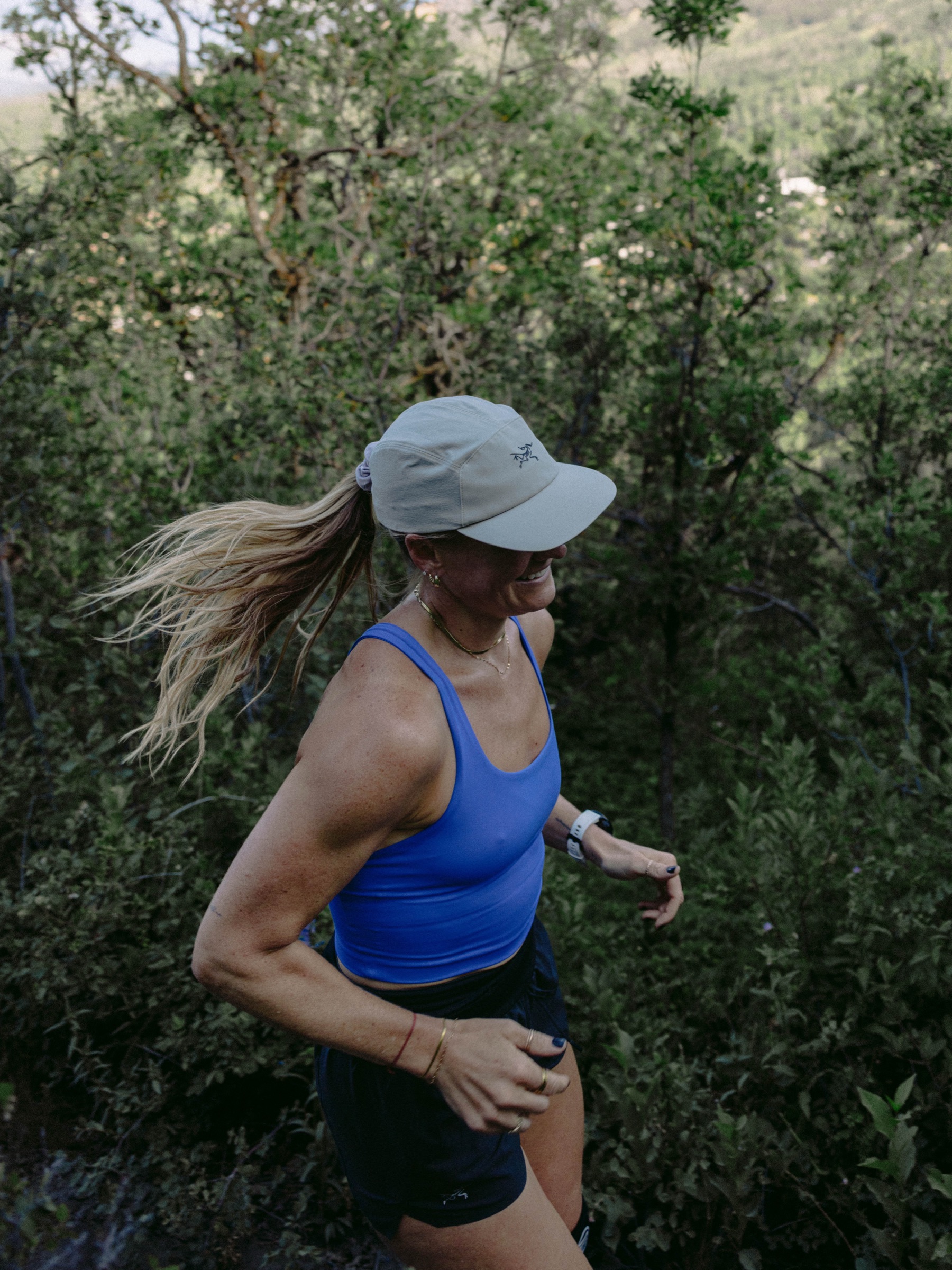 Model in Arc'teryx gear in Colorado mountain terrain