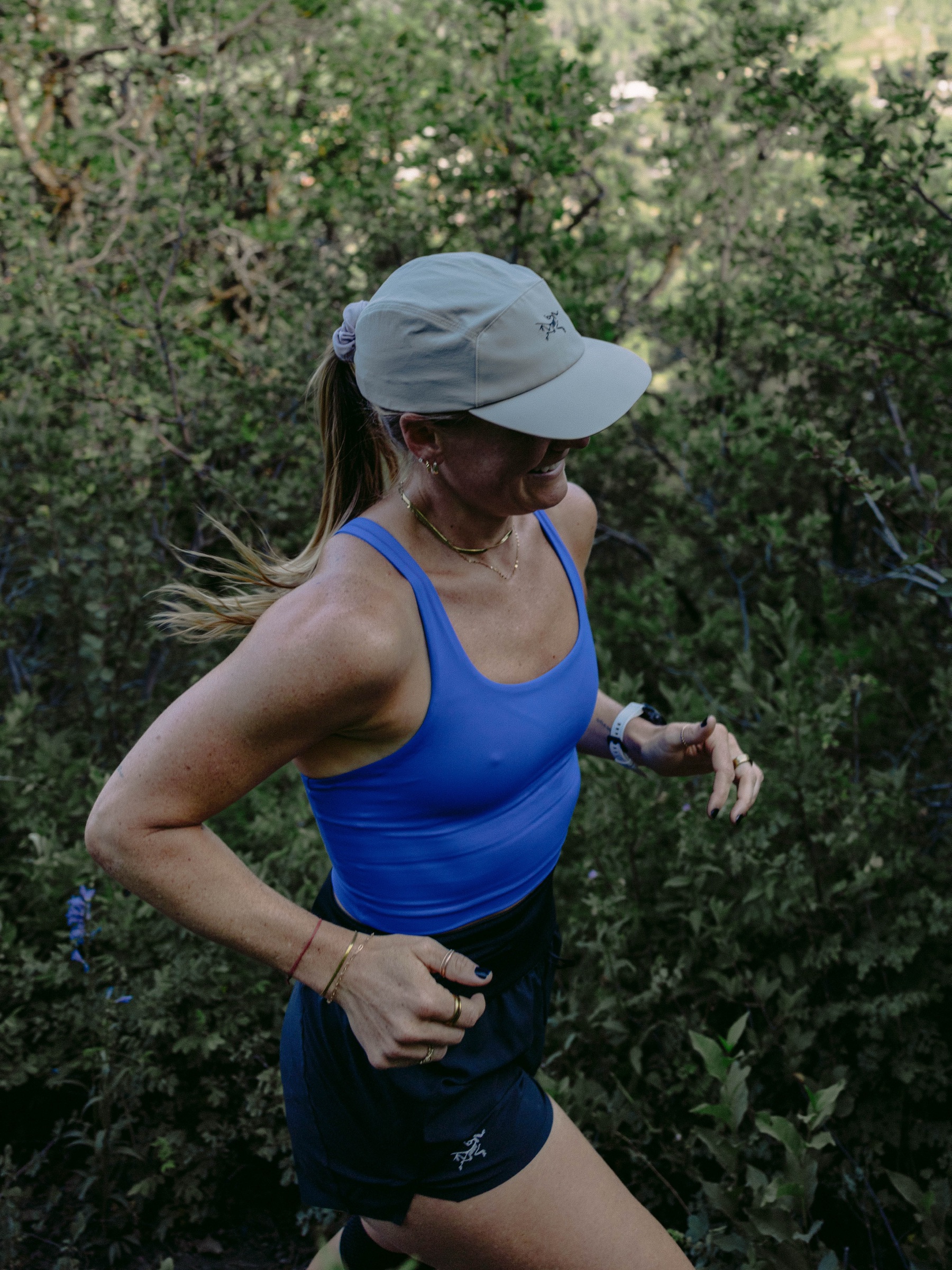 Model in Arc'teryx gear in Colorado mountain terrain
