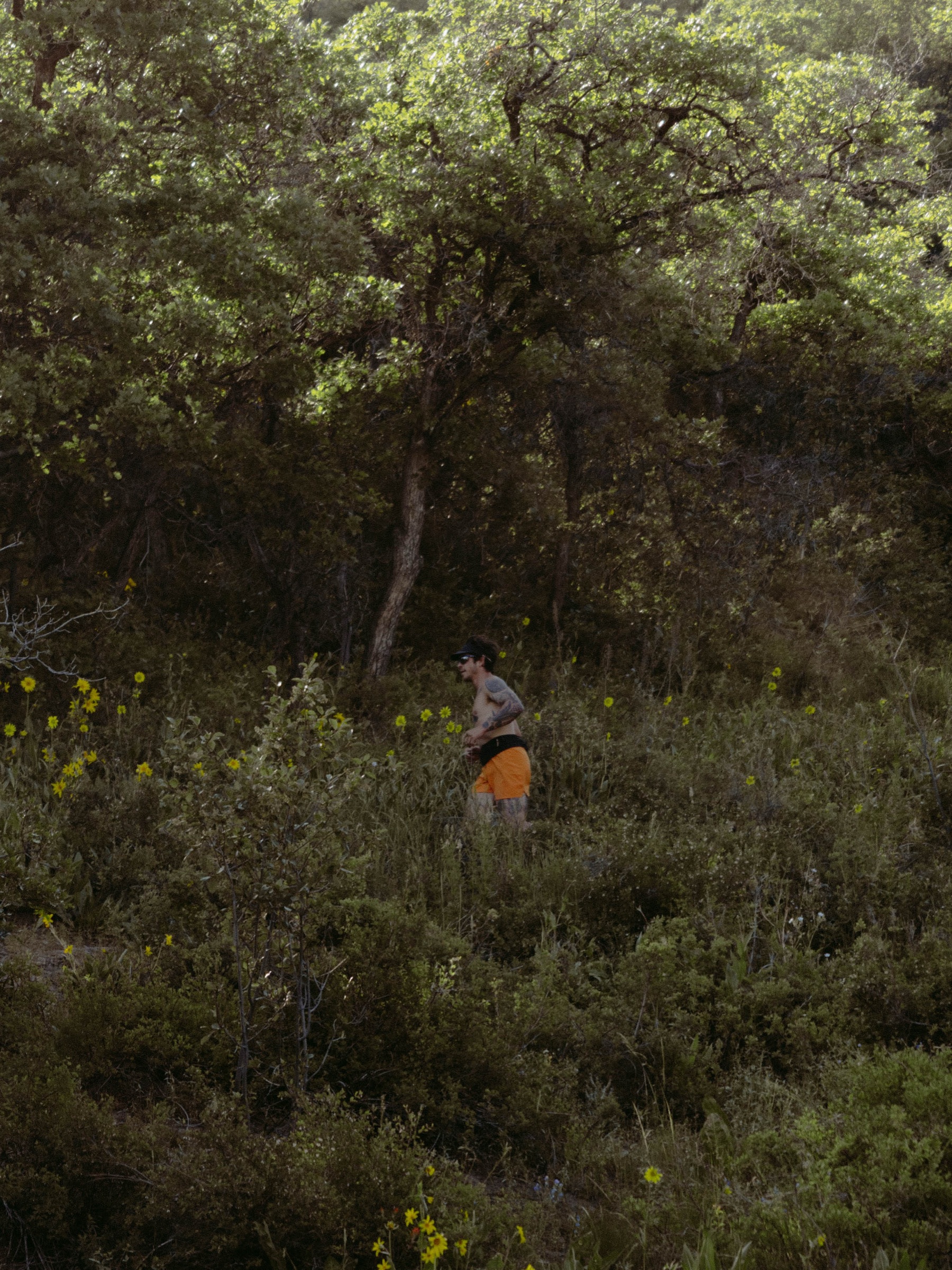 Model in Arc'teryx gear in Colorado mountain terrain